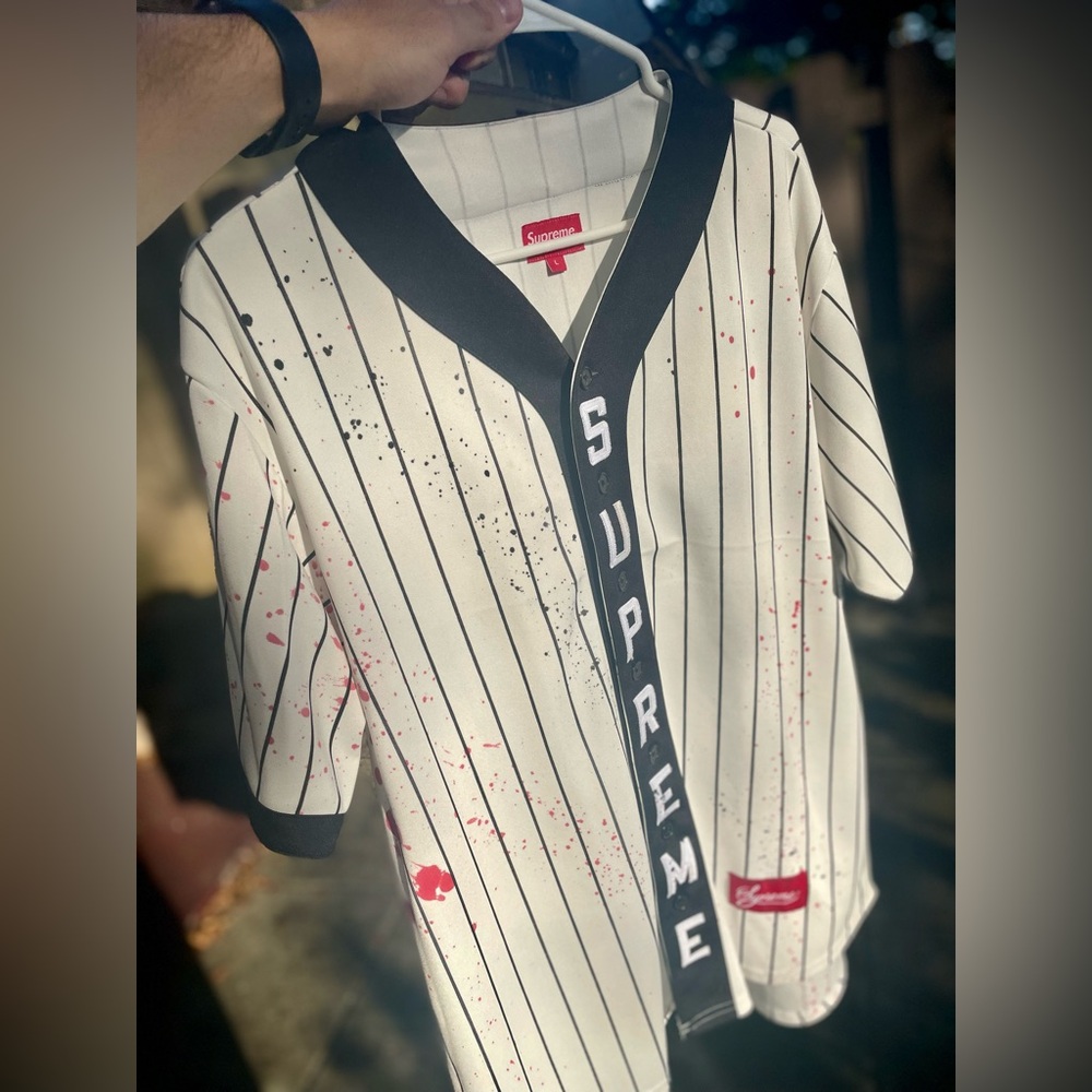 Supreme Jersey SZ Large lightly hand painted with spray paint by an artist.